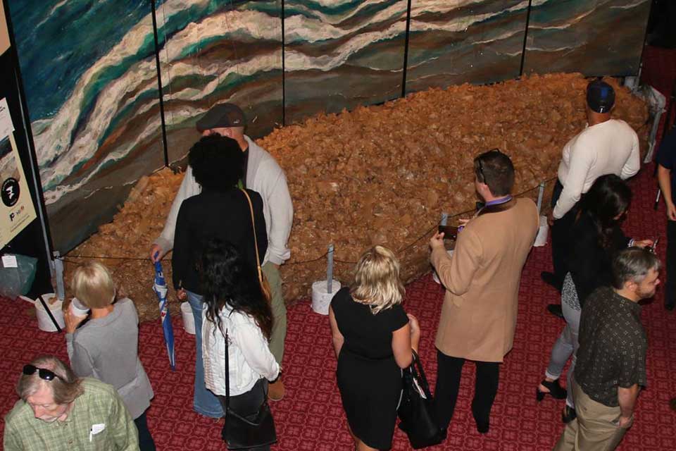 Visitors interact with Let Go exhibit at ArtPrize Nine