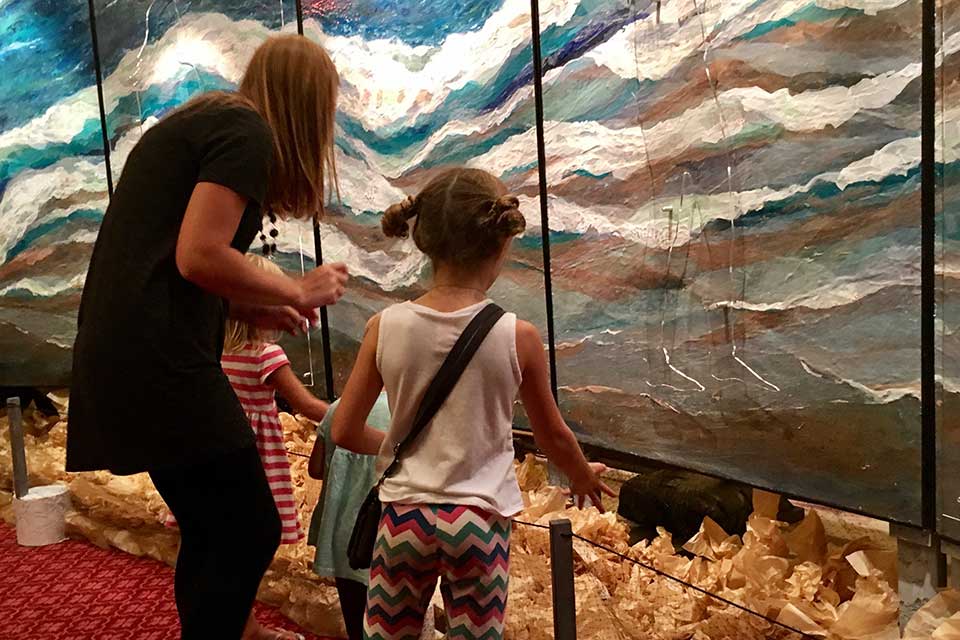 ArtPrize Nine visitors interact with Let Go