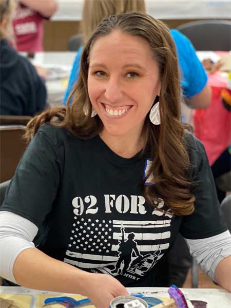 Veterans and families during workshops creating art for Yellow Ribbon installation